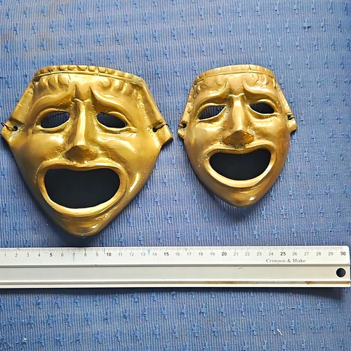 Cast brass theatrical masks